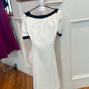 Black-and-white dress with millet sleeves and -line skirt